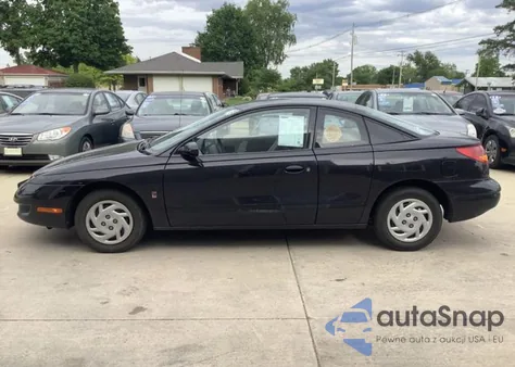 1999 Saturn Sc1 z USA, uszkodzony, nr VIN 1G8ZP1283XZ324457